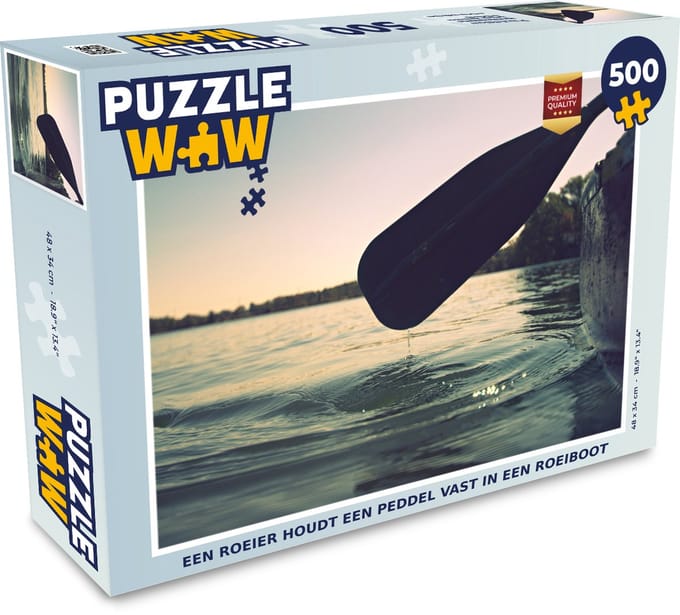 Puzzel Een roeier houdt een peddel vast in een roeiboot - Legpuzzel - Puzzel 500 stukjes
