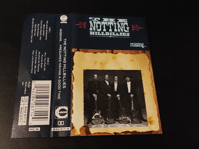 THE NOTTING HILLBILLIES - MISSING…PRESUMED HAVING A GOOD TIME (MC)