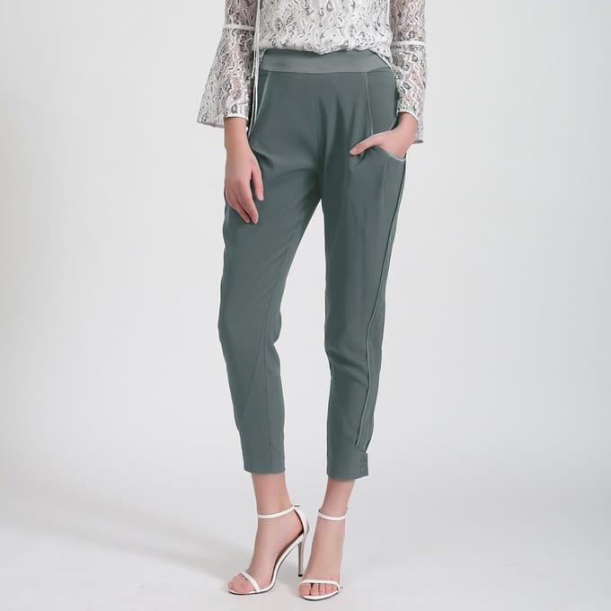 Bi-materiaal taps toelopende broek