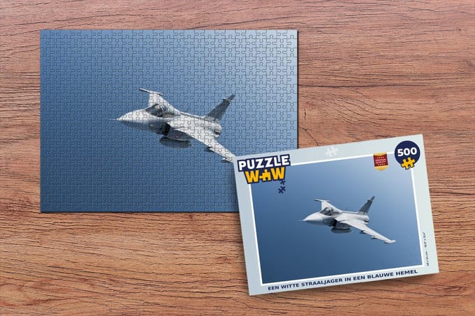 Puzzel Een witte straaljager in een blauwe hemel - Legpuzzel - Puzzel 500 stukjes