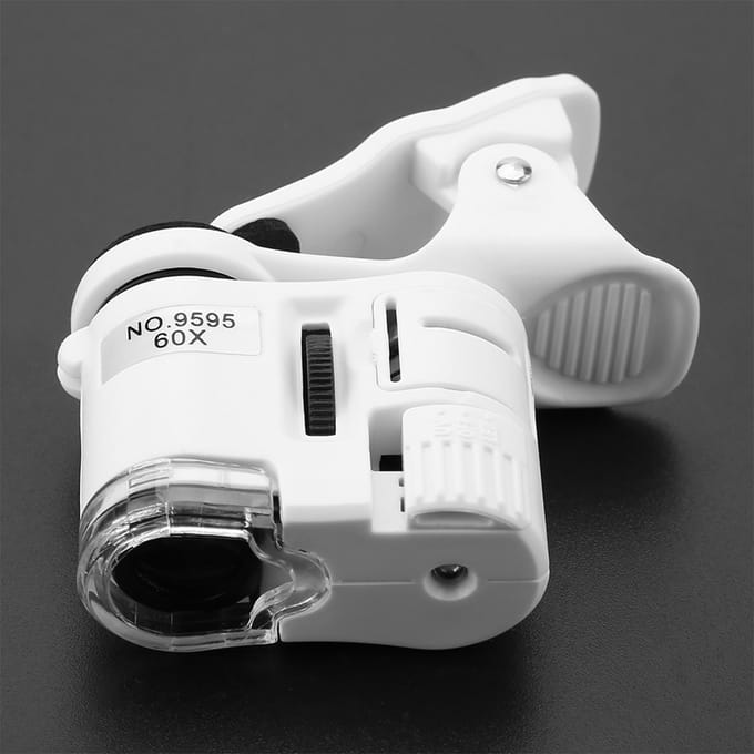 9595W 60X Vergrootglas LED UV-licht Mini Mobiele Telefoon Clip Microscoop
