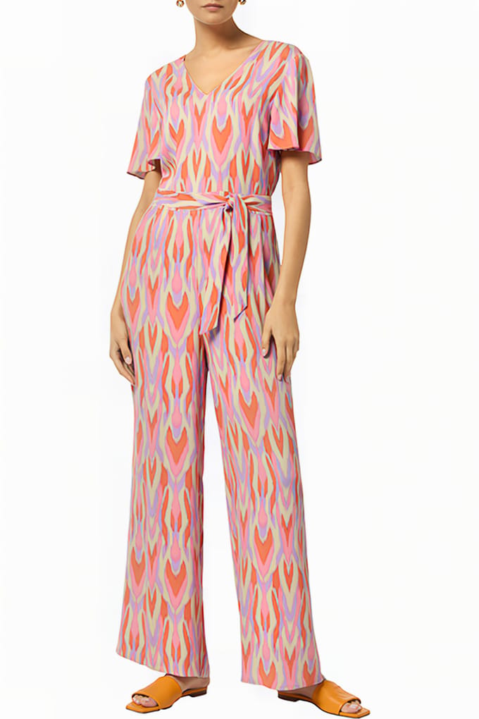 Jumpsuit van viscose met all-over motief en strikceintuur