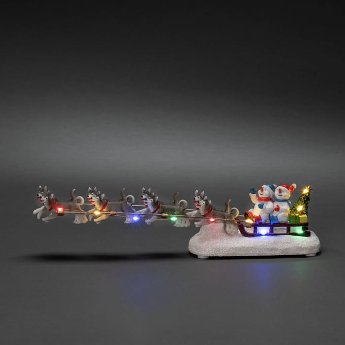 Konstsmide Kerstman in slee beeldje - met verlichting - 37,5 x 8,5 x 6,5 cm - kerstdorp figuur - kerstbeeldje
