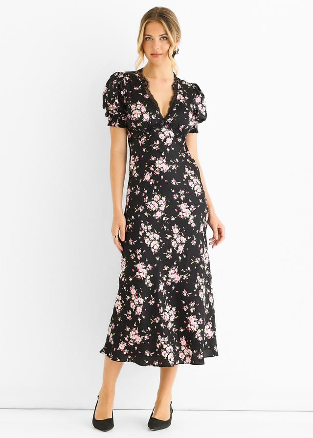 Zwarte midi-jurk met bloemenkant en schuine zoom