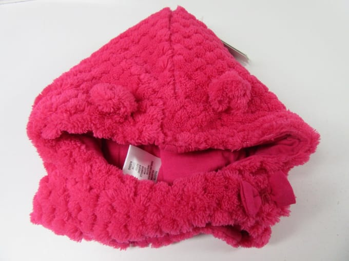 muts in fuchia van Noukie's  T0  // 43 cm  //0-3 maand