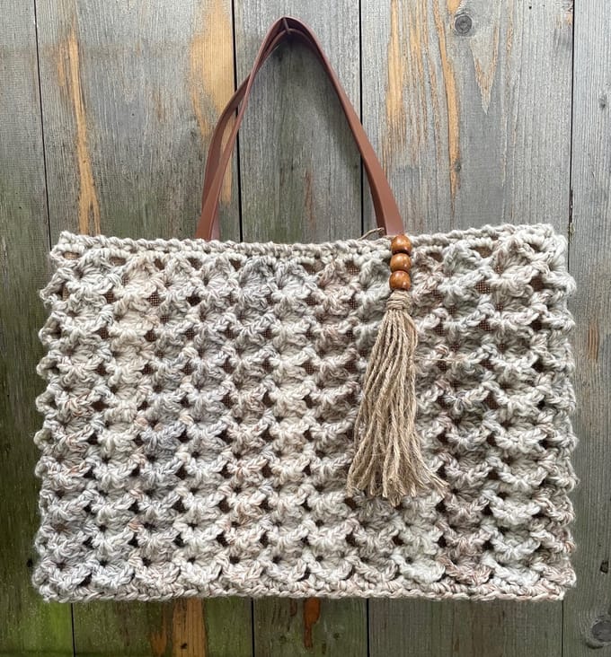 HAAKPAKKET TAS 'V-TAIGA' JUTE.