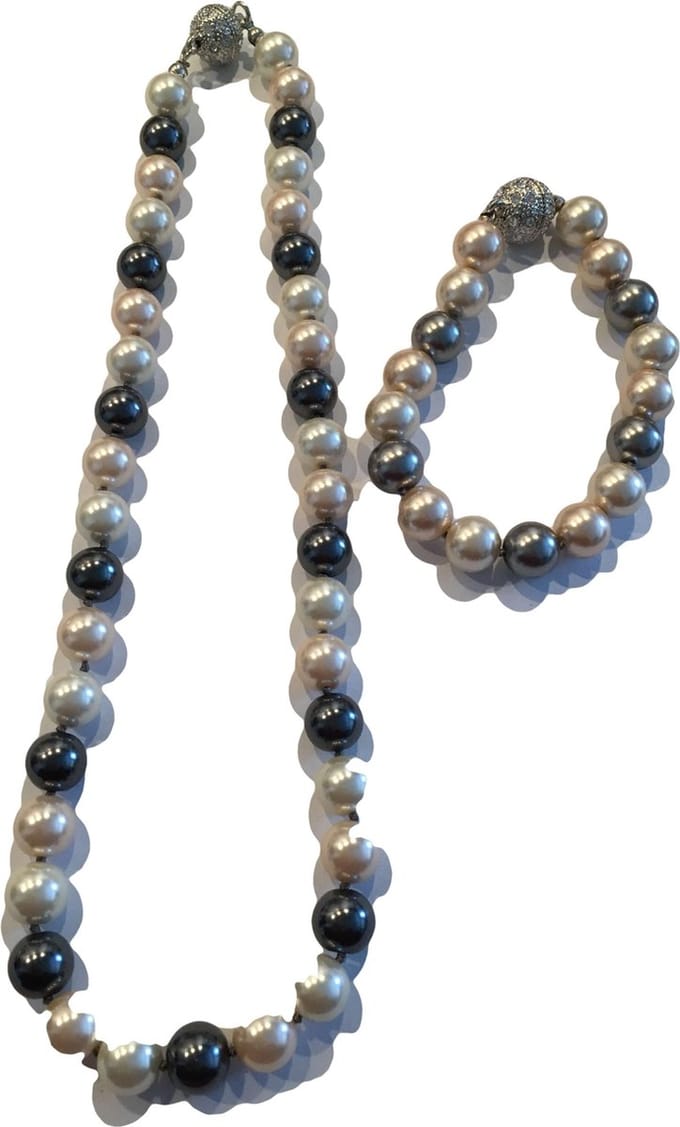 Parelset zalm grijs/zwart (ketting en armband)