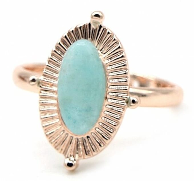 Rose goudkleurige ring met turquoise siersteen