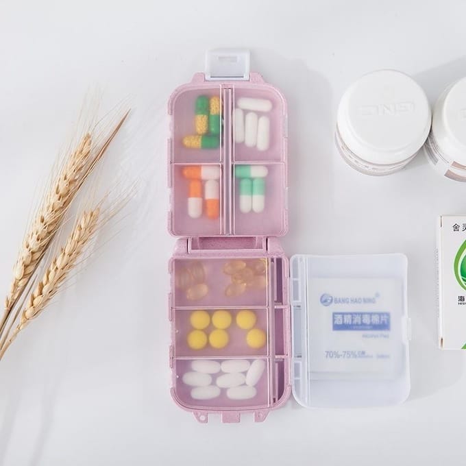 Petite boîte à médicaments créative scellée à trois niveaux, boîte à médicaments Portable pliable à trois sections, Mini boîtes de rangement à 8 compartiments rose