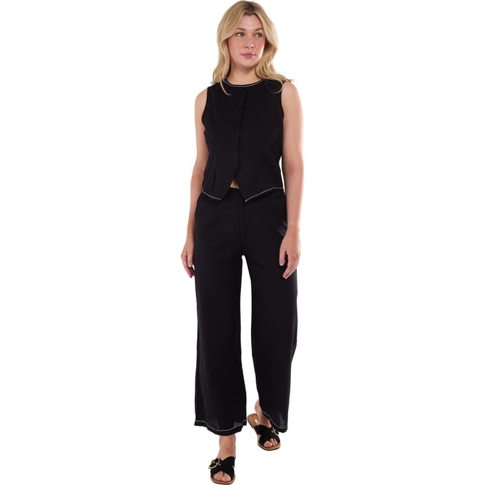 Zwarte broek met contrastborduursel en stikdetails