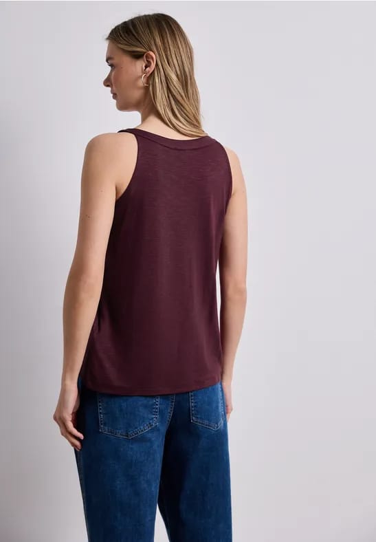 Top met V-hals en decoratief detail