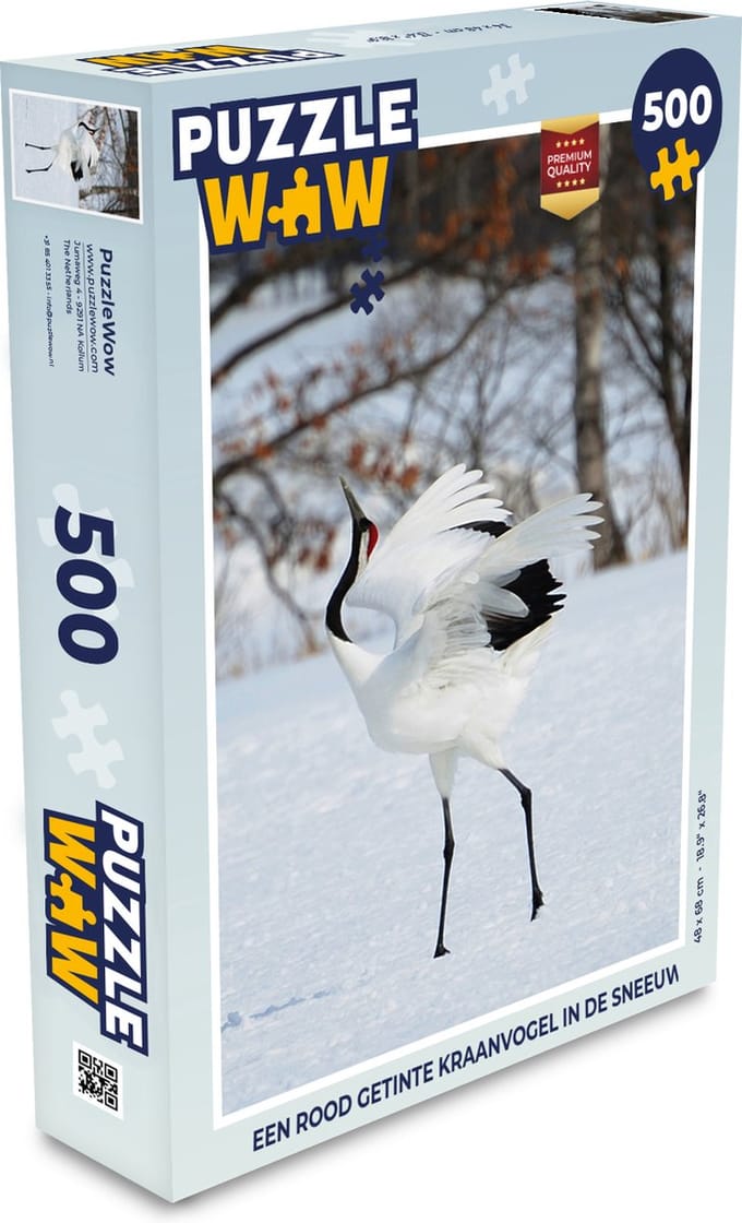 Puzzel Een rood getinte kraanvogel in de sneeuw - Legpuzzel - Puzzel 500 stukjes