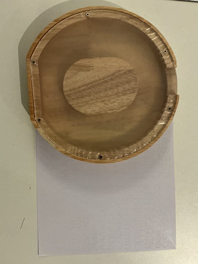 SPAARPOT HOUT LETTER O