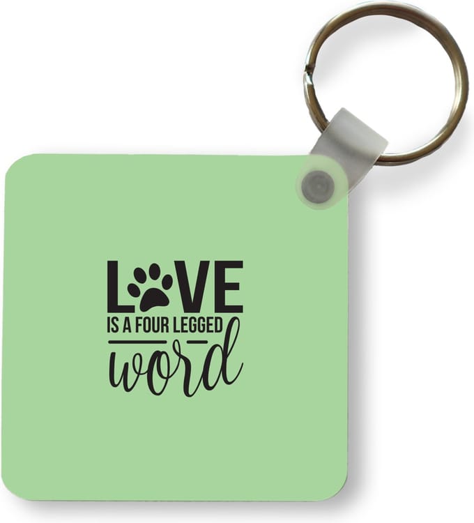 Sleutelhanger - Uitdeelcadeautjes - Quotes - Spreuken - Hond - Love is a four legged word - Plastic