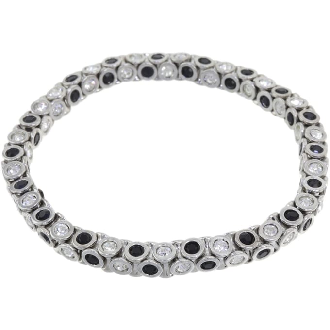 Behave - elastische armband met zwarte steentjes - avondstijl
