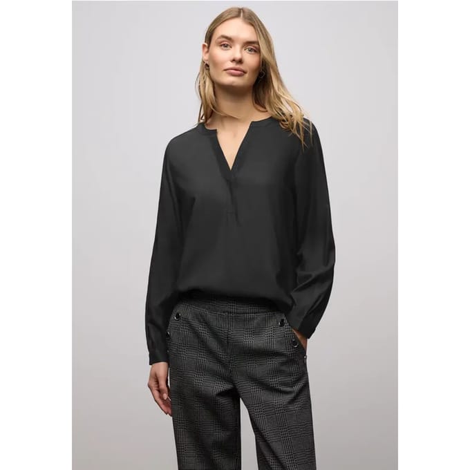Blouse met glitterdetail