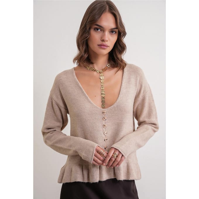 Lichte V-hals gebreide top met knoopdetails