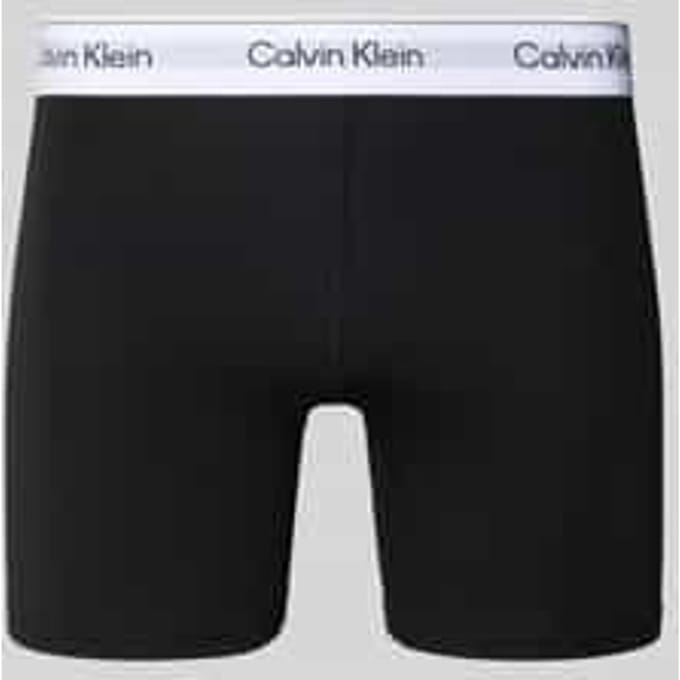 Broek met label in band