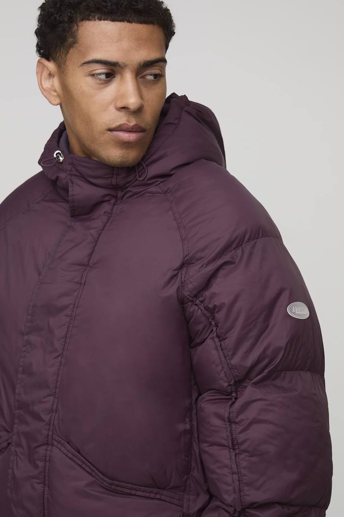 Pufferjack met oversized pasvorm, geraffelde mouwen en panelen | Plum | Size Medium