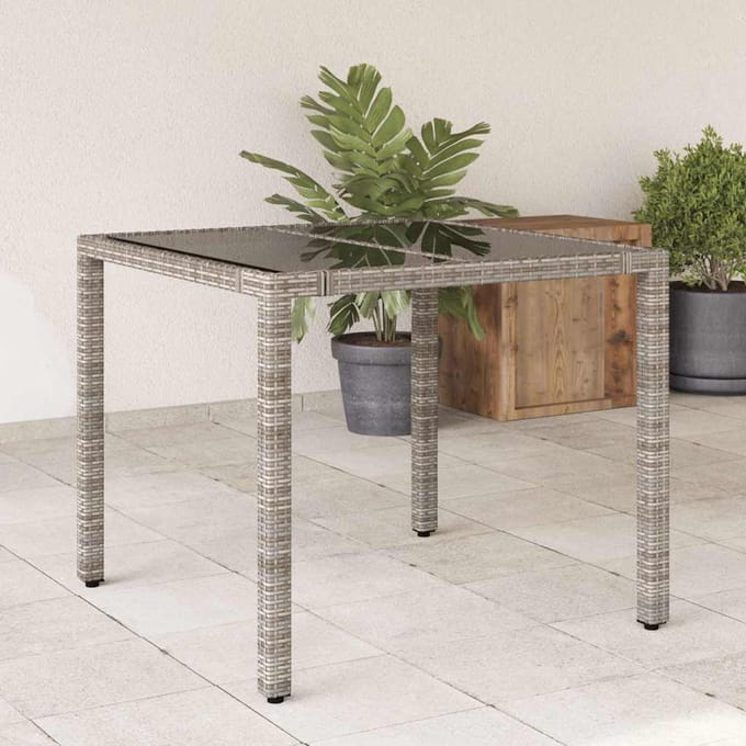 vidaXL Tuintafel met glazen blad 90x90x75 cm poly rattan grijs