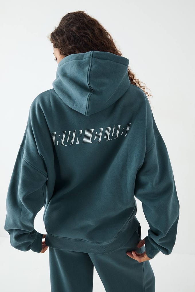 Dames DSGN Studio Run Club Bedrukte Oversized Hoodie | Teal | Maat: XL