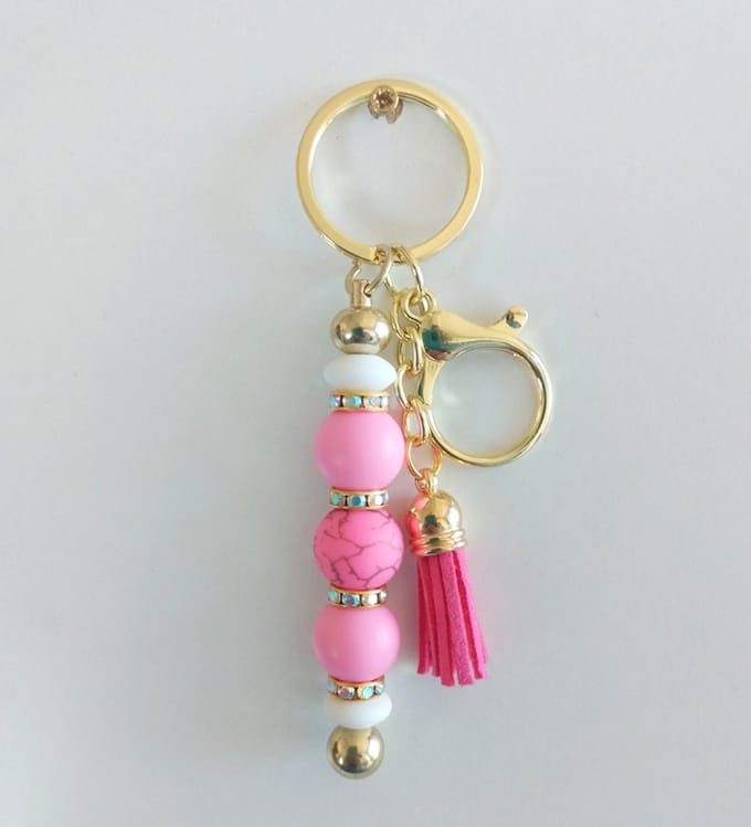 Sleutelhanger, tashanger met kralen | roze | bloem | goudkleurig