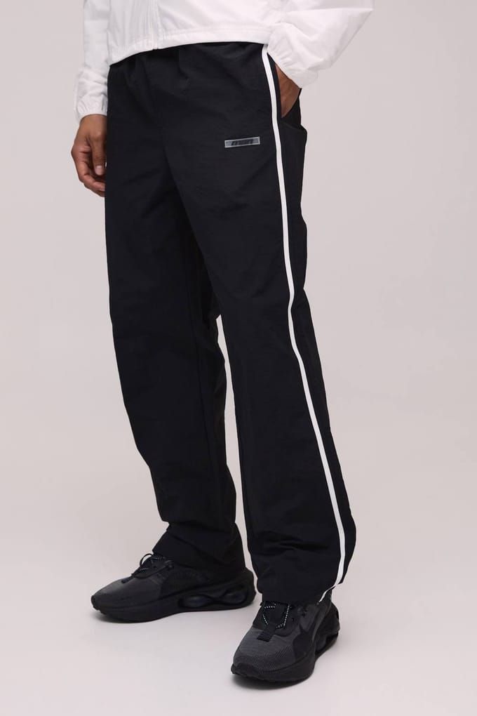 Relaxed Fit Side Stripe Logo Print Nylon Track Pants | Black | Size Medium