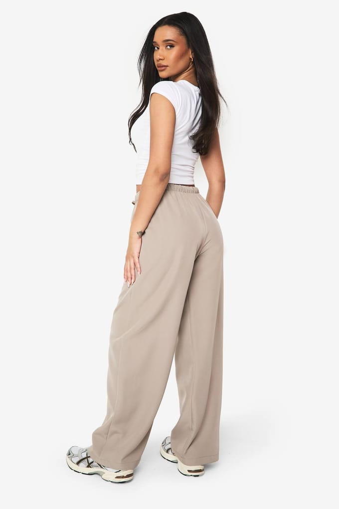 boohoo Dames Geweven Elastische Low Rise Wijde Pijp Broek | Zand | Maat: 42
