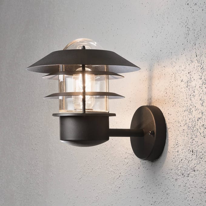 Konstsmide Buitenwandlamp Modena, staand, zwart