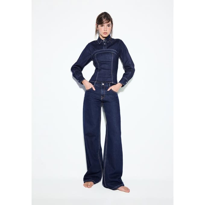 Stradivarius D91 Low-rise wide-leg jeans  OVERGEVERFDE DENIM WASSING 38
