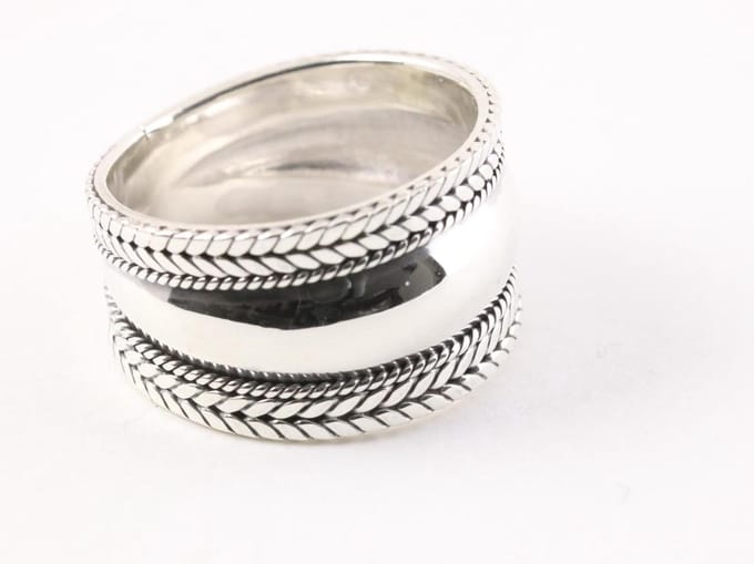Brede hoogglans zilveren ring met kabelpatronen - maat 19.5