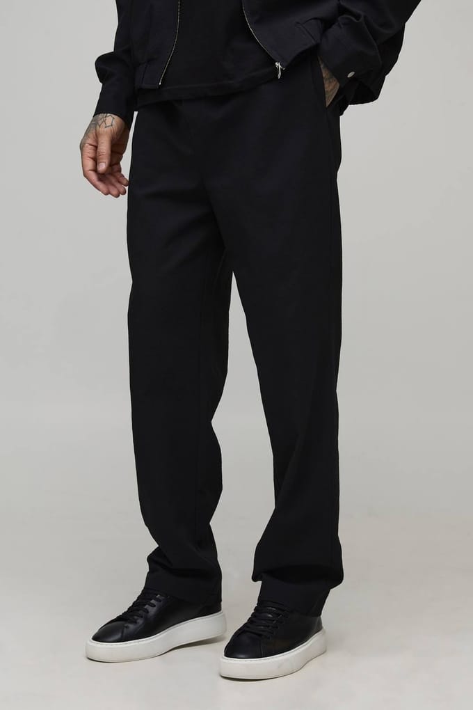 Lange Getextureerde Geweven Seersucker Joggingbroek met Toelopende Pijpen | Black | Size Medium