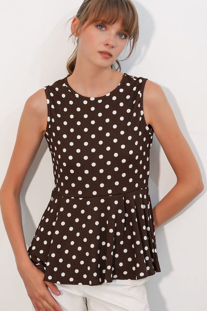 Effen Mouwloze Crepe Blouse met Stippen