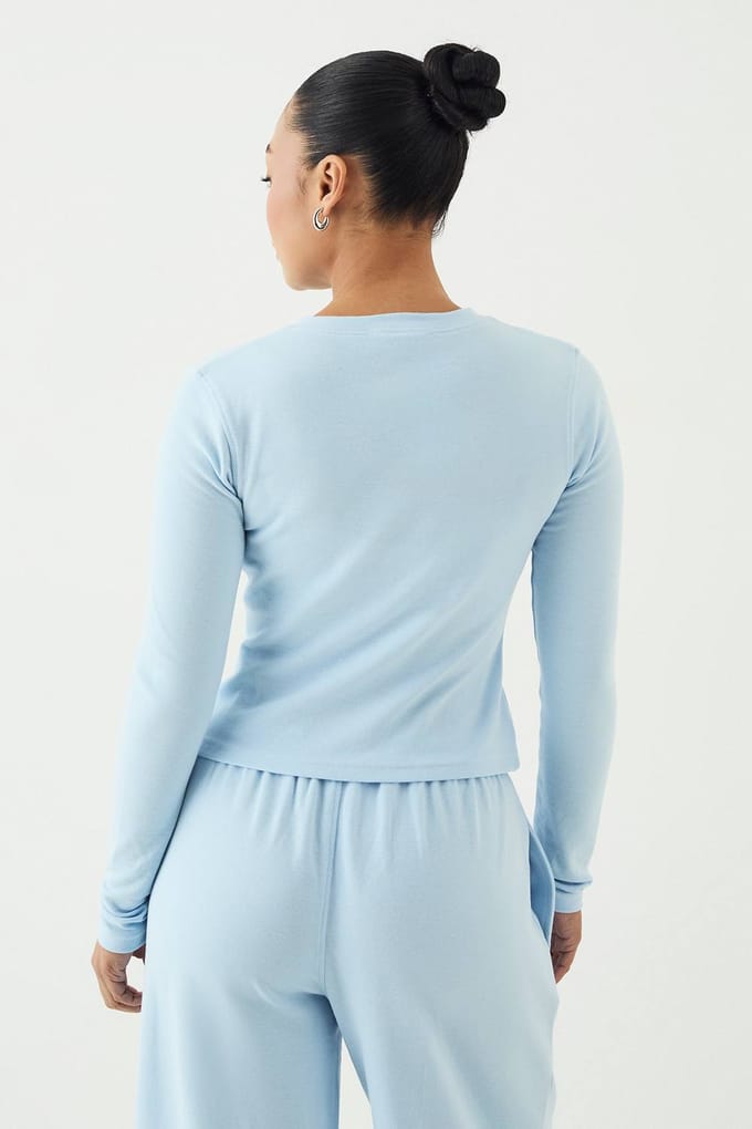 Dames Dsgn Studio Geribbelde Script Borduurwerk Doorknoop Lange Mouw Top | Light Blue | Maat: 2XL