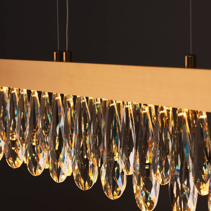 Brilliant LED hanglamp Celestia, lengte 110 cm messingkleurig kristal