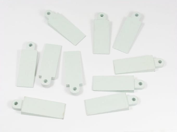 Pack van 10 witte zachte rubberen deur- en vensterwiggen 50mm x 21mm