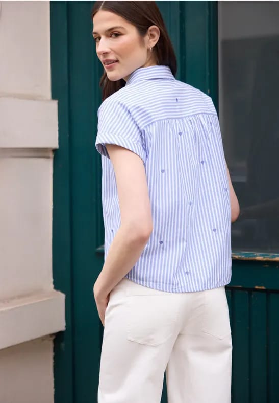 Blouse met hangende schouder en borduursel