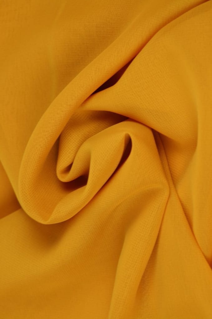 15 meter chiffon stof - Okergeel - 100% polyester