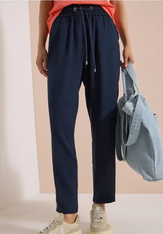 Mid Waist Slim Leg broek in Loose Fit