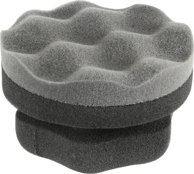 Spons voor wassen en waxen met handvat