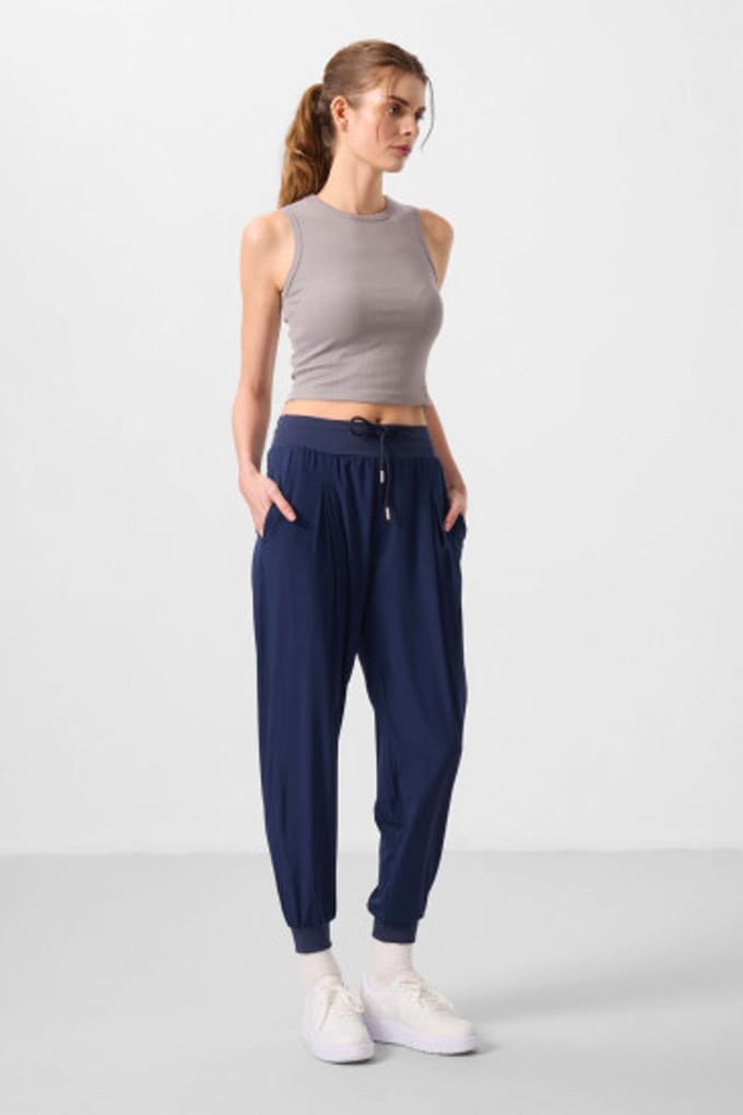 Mid-waist dunne jersey joggingsbroek met zak