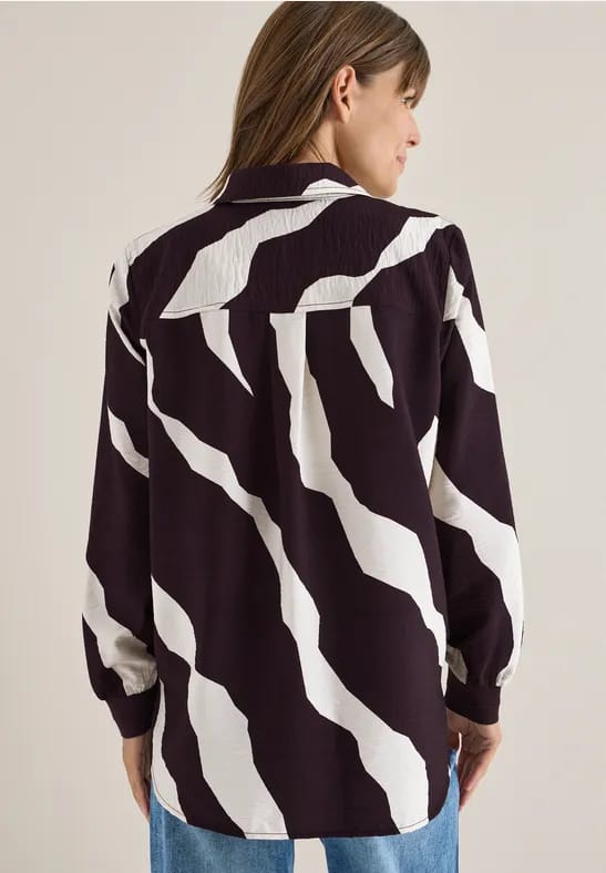 Bedrukte blouse met getapete manchetten