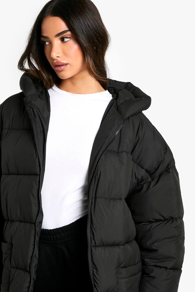 boohoo Dames Petite Oversized Capuchon Lange Pufferjas | Black | Maat: 8