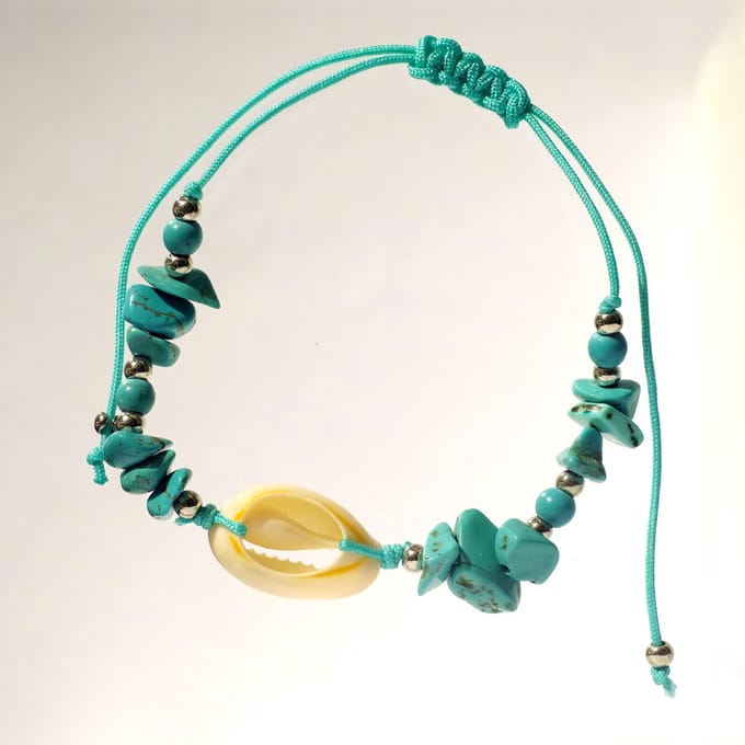 Armband met kauri en turquoise kralen