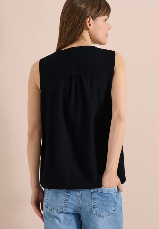 Blousetop met gespleten hals en linten