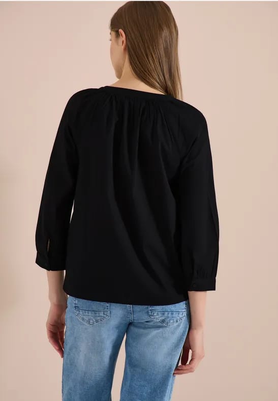 Blouse met 3/4 mouwen en gespleten hals in effen kleur