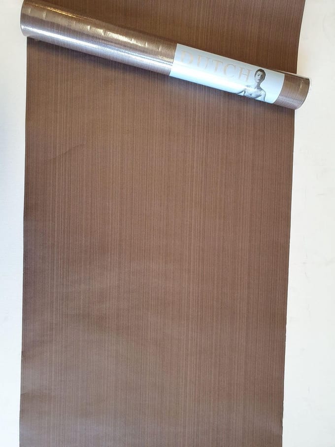 Dutch Wallcoverings Vliesbehang uni - bruin