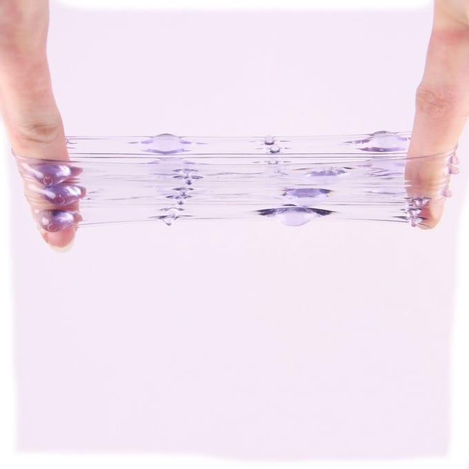 Siliconen penis sleeve met bobbeltjes - paars