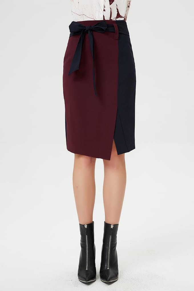 Asymmetrische kleurblokrok rok met knoopriem
