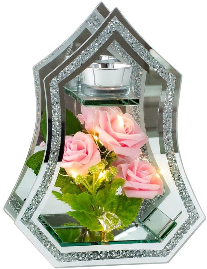 Glazen decoratie met rozen en theelichtje